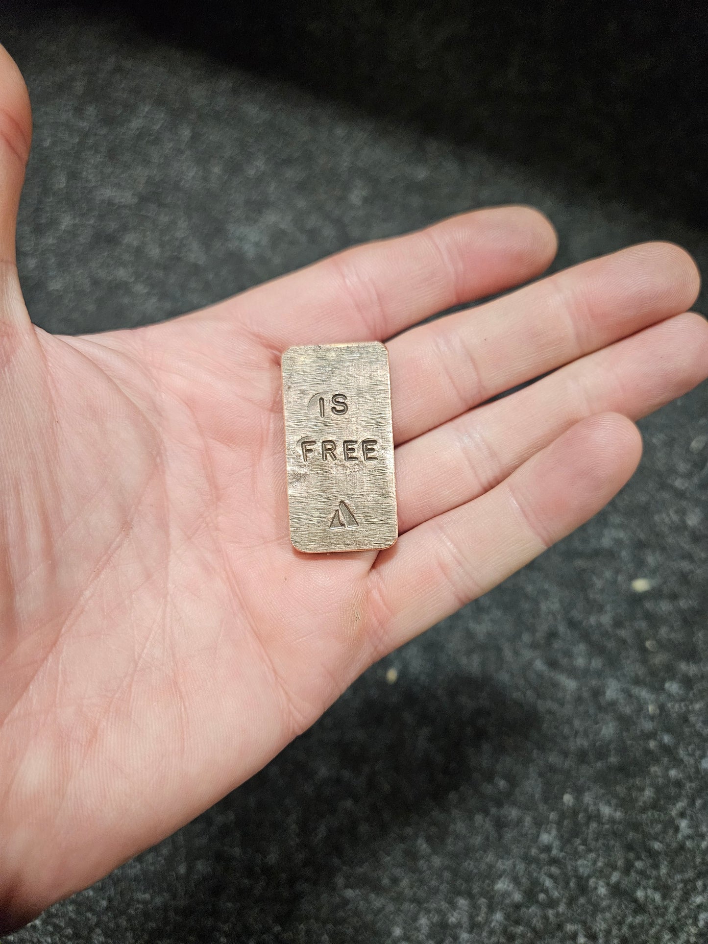 'Who Is Brave, Is Free' Steel and Copper worry stone. Steel and copper Haptic coin. Worry stone, haptic stone, touch stone.